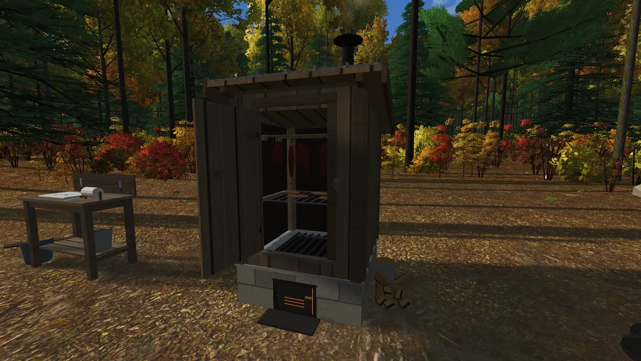 The smokehouse with its door open: meat on hooks, fish on the rack and the firebox glowing