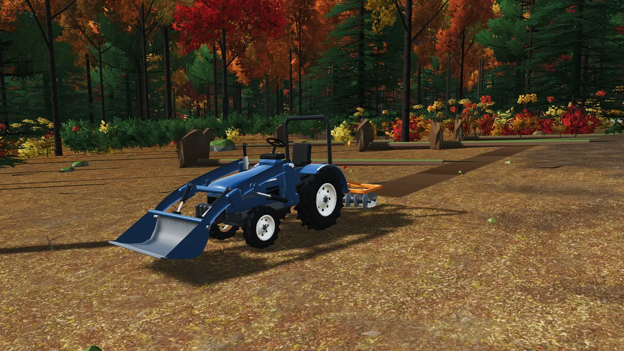 The tractor with its loader pulling a disc harrow across a field